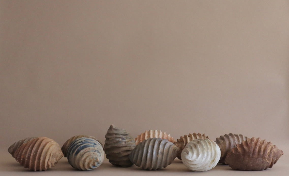 1960s Vintage Collection of 11 Clay Swirls
