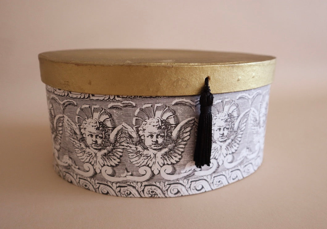 Oval Gold Lidded Box With Tassel