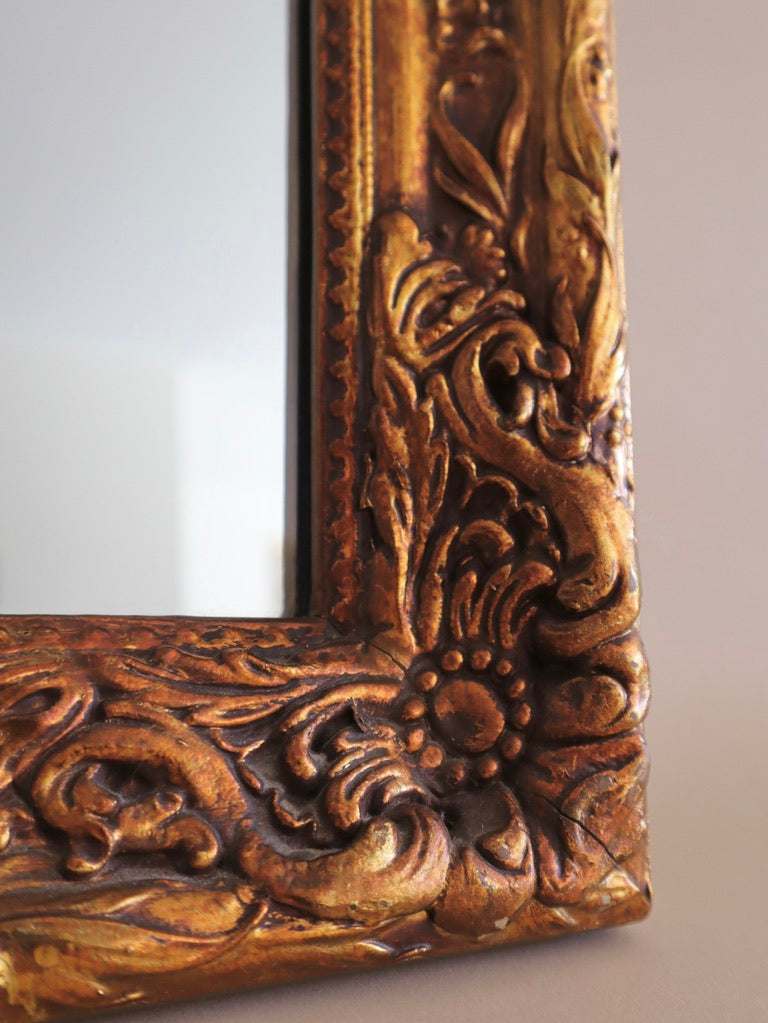 1970s Carved Floral Wood Mirror Finished in Gold Gilt