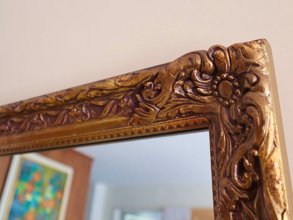 1970s Carved Floral Wood Mirror Finished in Gold Gilt