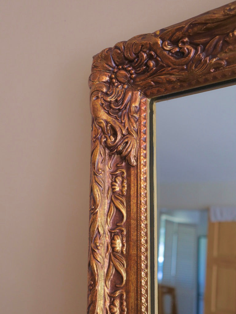 1970s Carved Floral Wood Mirror Finished in Gold Gilt